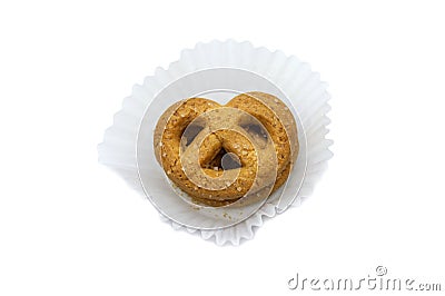 Christmas Danish style butter cookies biscuit placed in the white ruffled paper baking molds in the plastic packaging close-up on Stock Photo