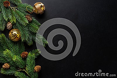 Christmas deco with fir and baubles on dark Stock Photo