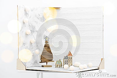 Christmas decor and double-sided backdrops on table in photo studio, bokeh effect Stock Photo