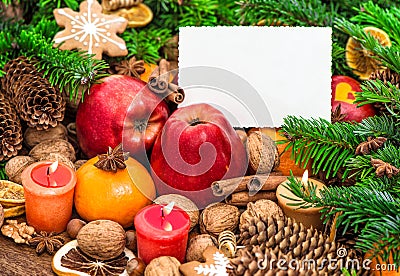 Christmas decoration burning candles greetings card Apples tangerine Stock Photo