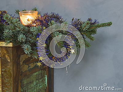 Christmas decoration candle in glass and decorated on spr Stock Photo