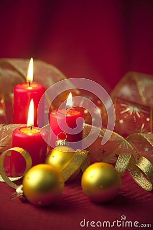 Christmas decoration with candles and ribbons Stock Photo