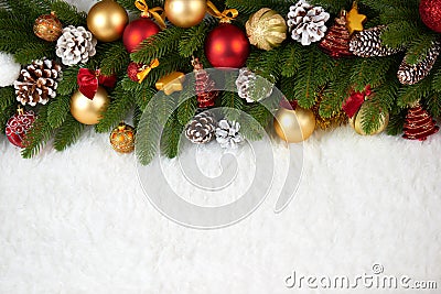 Christmas decoration on fir tree branch closeup, gifts, xmas ball, cone and other object on white blank space fur, holiday concept Stock Photo