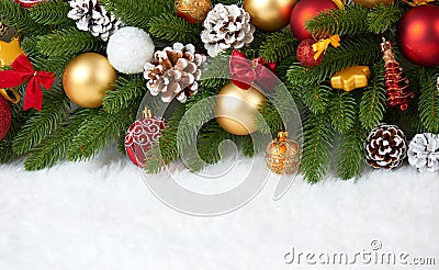 Christmas decoration on fir tree branch closeup, gifts, xmas ball, cone and other object on white blank space fur, holiday concept Stock Photo