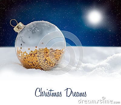 Christmas decoration glass ball at snowy night Stock Photo