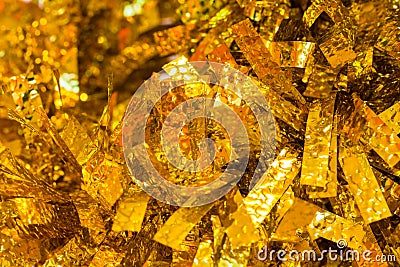 Christmas decoration - Gold and yellow Christmas tinsel is as Christmas light Abstract background Stock Photo