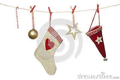 Christmas decoration, hat sphere sock candy cane hanging on washing line, isolated on white background Stock Photo