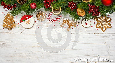 Christmas decoration with holiday tree branches, ball toys, gingerbread cookies Stock Photo