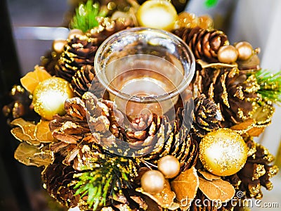 Christmas decoration made of cones. with cones, cinnamon, needles, nuts and flasks. Colorful Christmas Ornaments Stock Photo