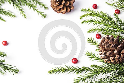 Christmas decoration of pine cone and leaves on white background Stock Photo