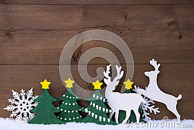 Christmas Decoration, Reindeer Couple, Snow, Green Tree Stock Photo