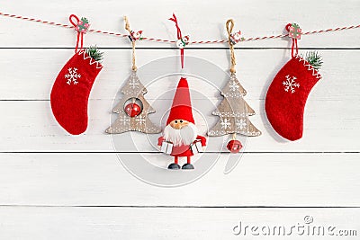 Christmas decoration with Santa and Christmas socks on white woo Stock Photo