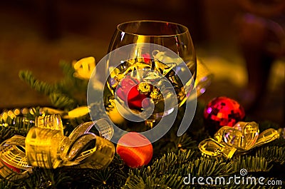 Christmas decoration, shiny colored stars in a glass Stock Photo