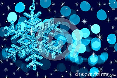 Christmas decoration snowflake on defocused lights Stock Photo