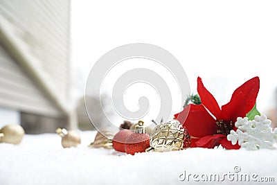 Christmas decoration. Christmas spruce with ball and blurred shiny lights. Christmas composition is with colorful balls on snow. C Stock Photo