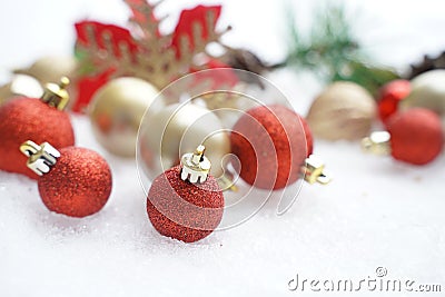 Christmas decoration. Christmas spruce with ball and blurred shiny lights. Christmas composition is with colorful balls on snow. C Stock Photo