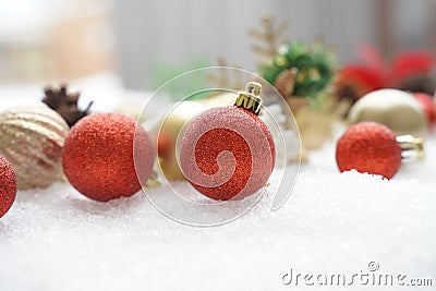 Christmas decoration. Christmas spruce with ball and blurred shiny lights. Christmas composition is with colorful balls on snow. C Stock Photo