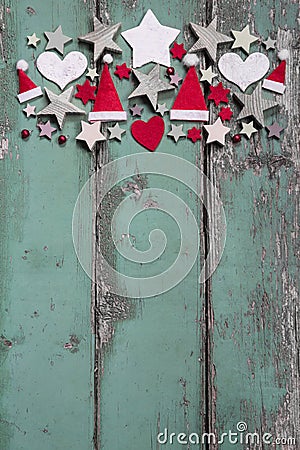 Christmas decoration at top on shabby green wooden background for a frame Stock Photo