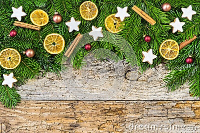 Christmas decoration on wood background with fir tree border Stock Photo