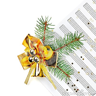 Christmas decorations on music sheets, closeup Stock Photo