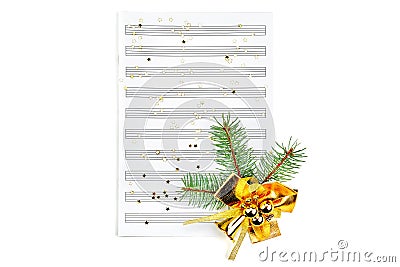 Christmas decorations on music sheets, closeup Stock Photo