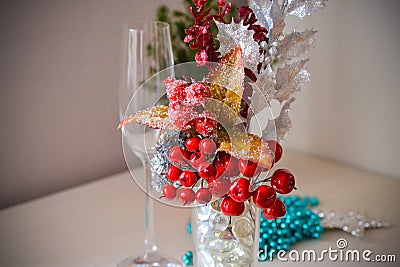 Christmas decorative composition of red berries in the snow with imitation of ice crystals. Glass Stock Photo