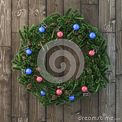 Christmas decorative wreath with balls on wood Stock Photo