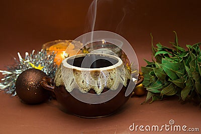 Christmas dinner: ceramic pot of hot steaming food Stock Photo