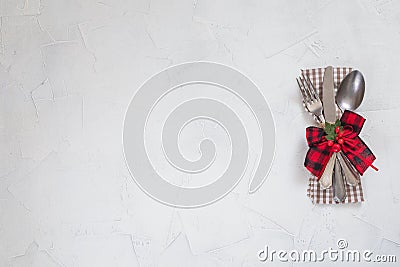 Christmas dinner table setting, decoration, concrete white background Stock Photo