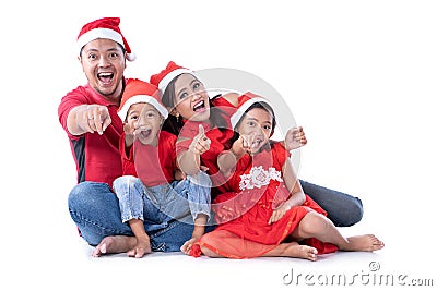 Christmas family asian pointing to camera Stock Photo