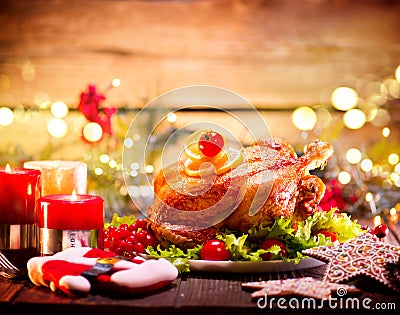 Christmas family dinner. Holiday decorated table with turkey Stock Photo