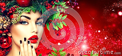 Christmas fashion woman. Holiday hairstyle and makeup Stock Photo