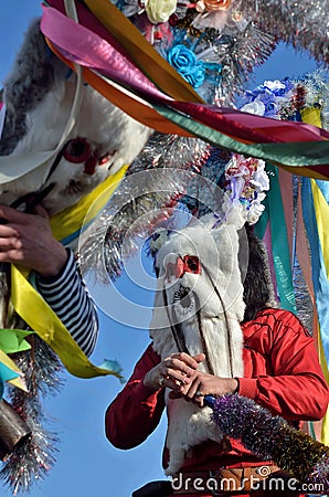 Christmas festival in romanian Orlovka Kartal village.Meeting of two archaic personages Did or Moshul,a good spirits. Editorial Stock Photo