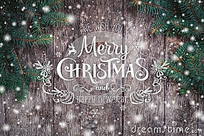 Christmas Fir branches on wooden background. Xmas and Happy New Year composition. Stock Photo