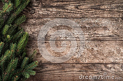 Christmas fir branches on wooden background. Xmas and New Year theme. Stock Photo