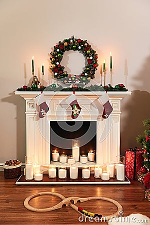 Christmas fireplace with Santa socks. Christmas stocking hanging from a mantel or fireplace Stock Photo