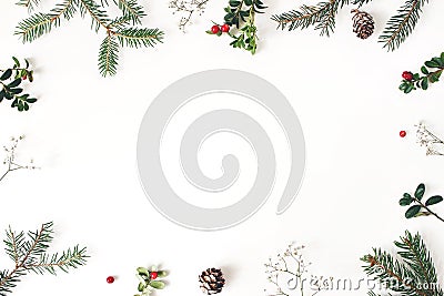 Christmas floral frame, decorative border. Winter composition of red cranberry branches, baby`s breath flowers, spruce Stock Photo