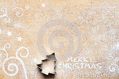 Christmas food background with cookie mold and flour. Merry Christmas inscription Stock Photo