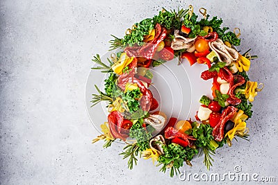 Christmas food background. Christmas wreath of holiday snacks, white background Stock Photo