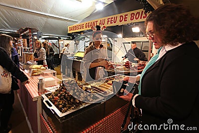 Christmas food market in Paris. Meat shop Editorial Stock Photo