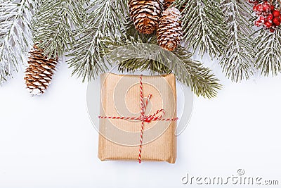 Christmas frame border on white, branches, cones and wrapped gif Stock Photo