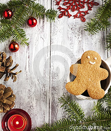 Christmas frame with Gingerbread cookie man and cup of tea Stock Photo