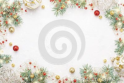 Christmas frame of spruce, red & gold christmas decorations on w Stock Photo