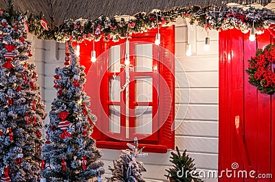 Christmas front door of a country house background. Decorated wi Stock Photo