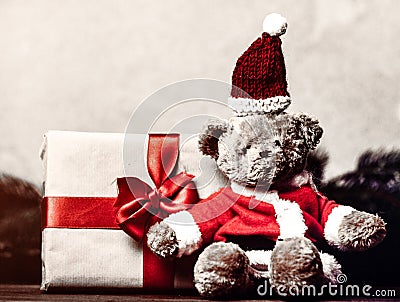 Christmas gift with bowknot and teddy bear toy Stock Photo