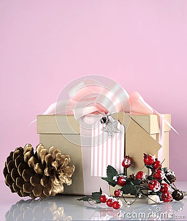 Christmas gift box in modern trend natural gift wrapping - vertical with copy space. Stock Photo