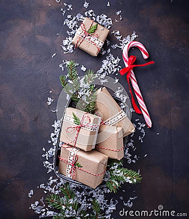 Christmas gift boxes and candy cane. Stock Photo