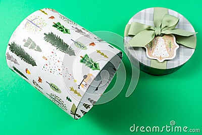 Christmas gift boxes on green background. Merry christmas greeting cards. Winter xmas holiday theme. Happy New Year Stock Photo