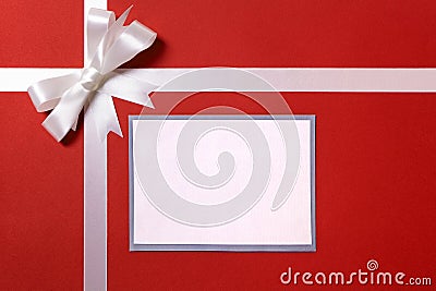 Christmas gift card or label and envelope, white ribbon bow, red Stock Photo