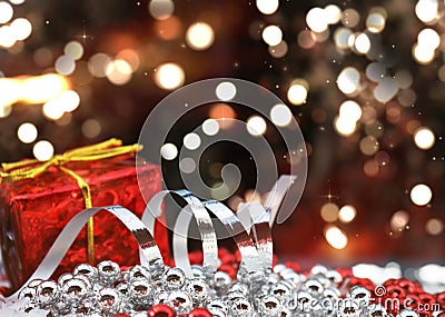 Christmas gift and decorations on defocussed bokeh lights background Stock Photo